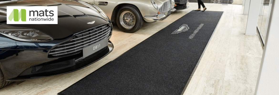 Aston martin logo on long floor mat